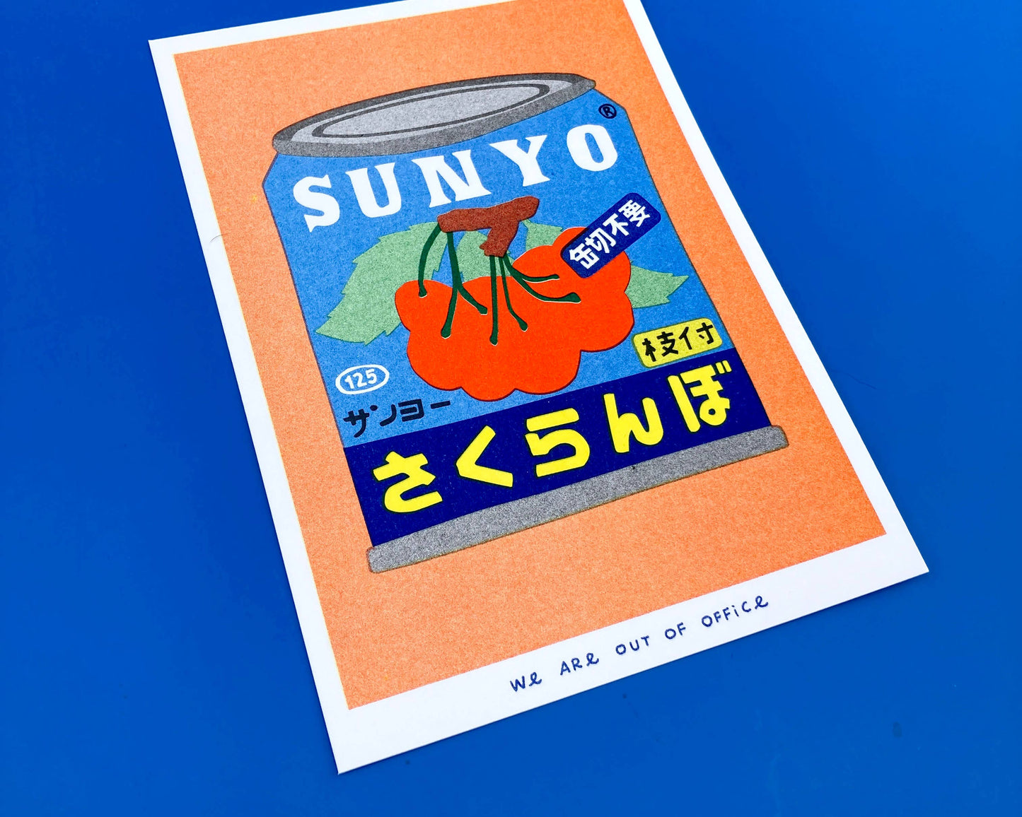 A risograph print of a canned cherries