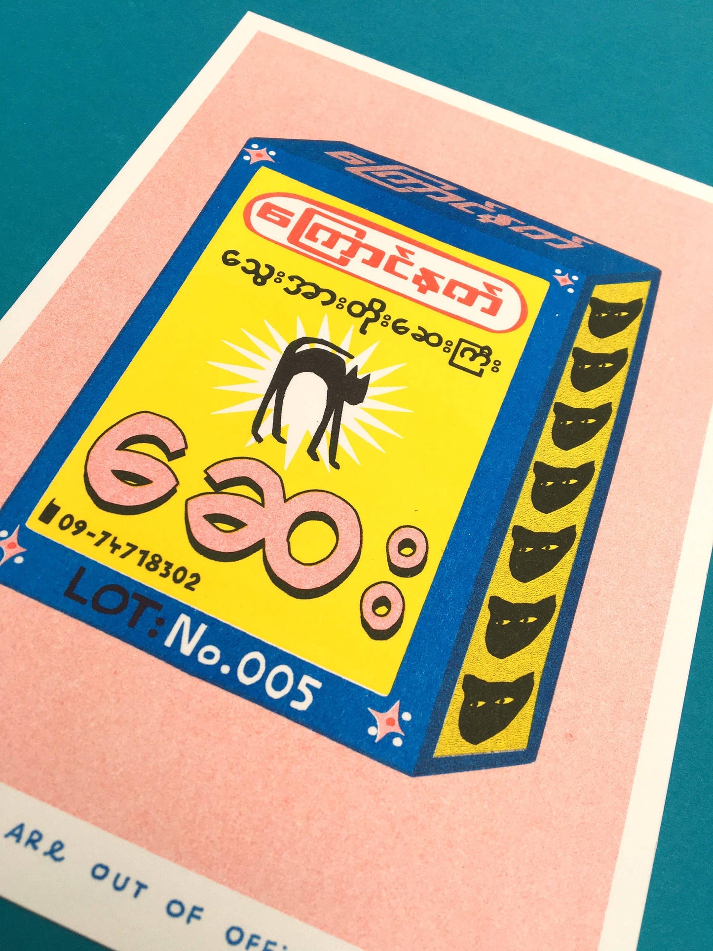 A risograph print of a package of Black Cat