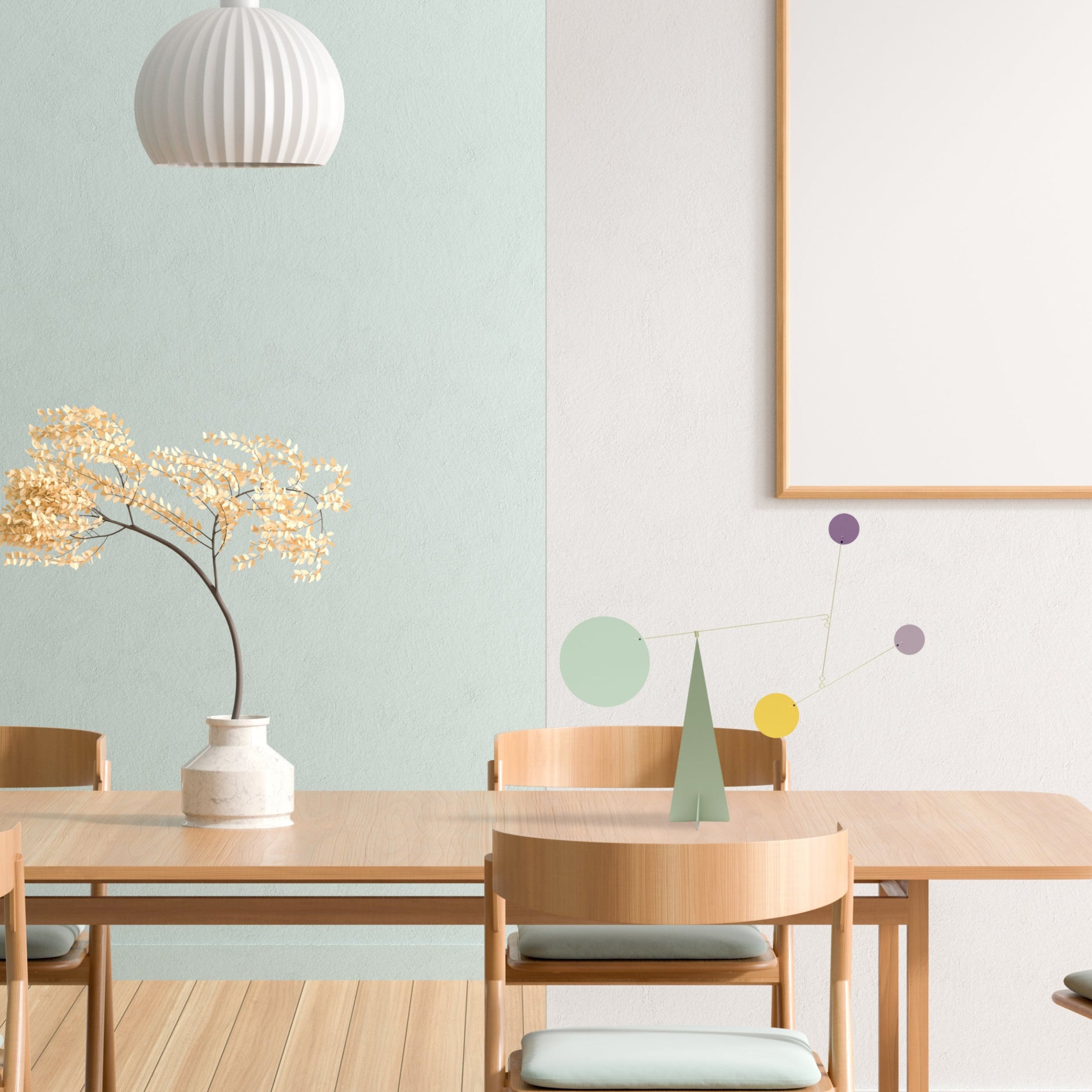 Dining room with wooden table, chairs, and decorative elements on a light green wall. Seoul Desk Mobile