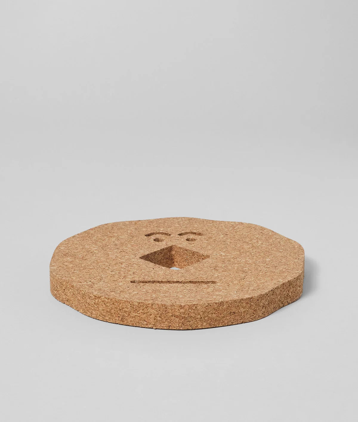 Face - Cork Trivet