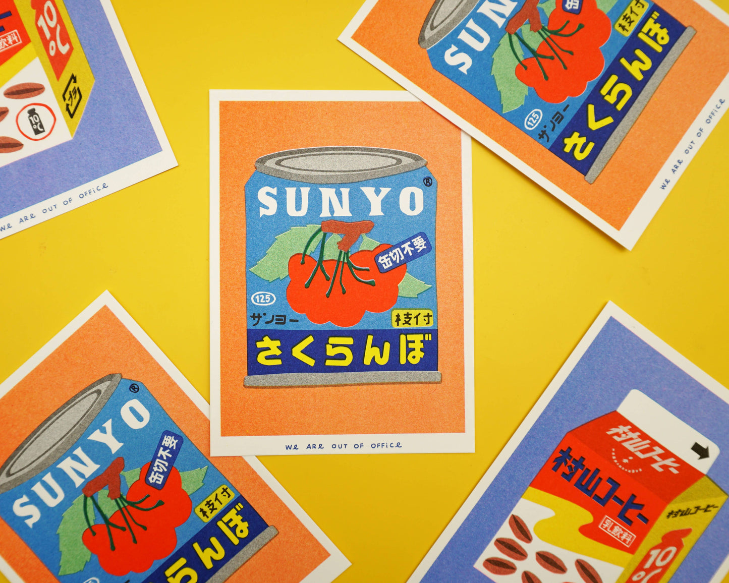 A risograph print of a canned cherries